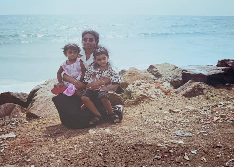A fond childhood picture: Vivetha's mother holding her and her brother in tkaranto (Toronto)