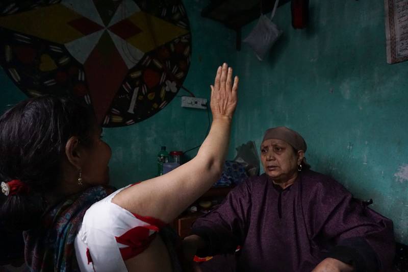 Faat Aapa, 65, a traditional bone-setter treating her patient in Gassipora village of south Kashmir’s Anantnag district. Working in a small and moderately lit room, Faat Aapa has treated thousands of patients for the past three decades.