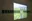 Untitled, 2019, oil on canvas with a video projection, 415 x 150 cm. Installation view from the exhibition *Laughter to Cry* at B-galleria, Turku. Photo: Veera Ahlholm