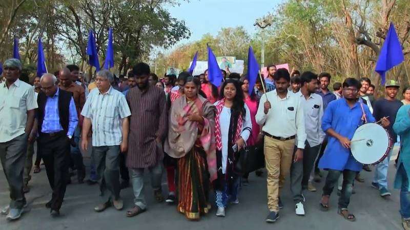 Still from *Dr. B. R. Ambedkar, Now and Then –* Radhika Vemula leading a protest march during Dalit Asmita Yatra