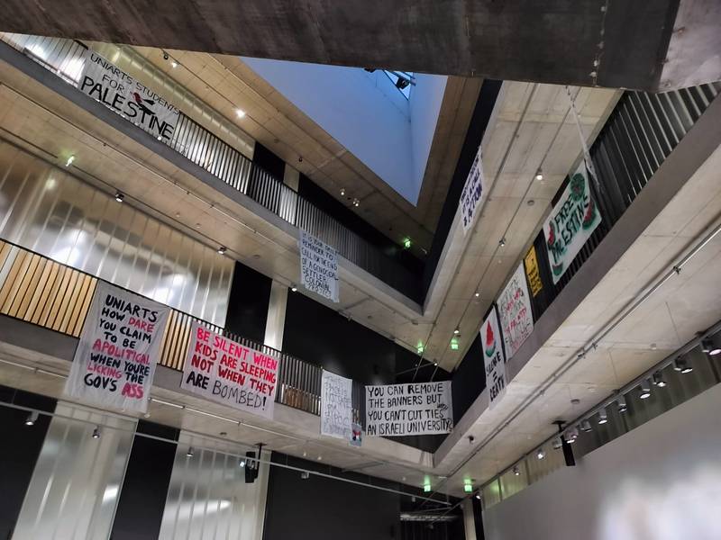 Banners made by Uniarts students, hung in the Helsinki Academy of Fine Arts staircase.