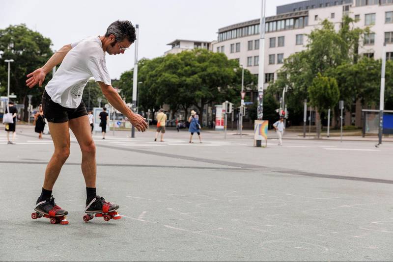 *Black masks on roller skates*, 2022 | Photo: Frank Sperling