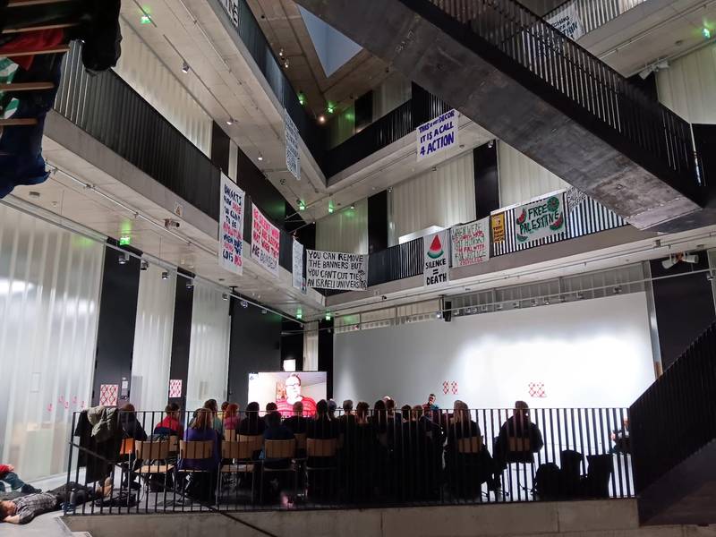 Political Participation in the University, an event organised by Uniarts. During the event students rehung banners in the staircase that had previously been removed by the university. February 2024.